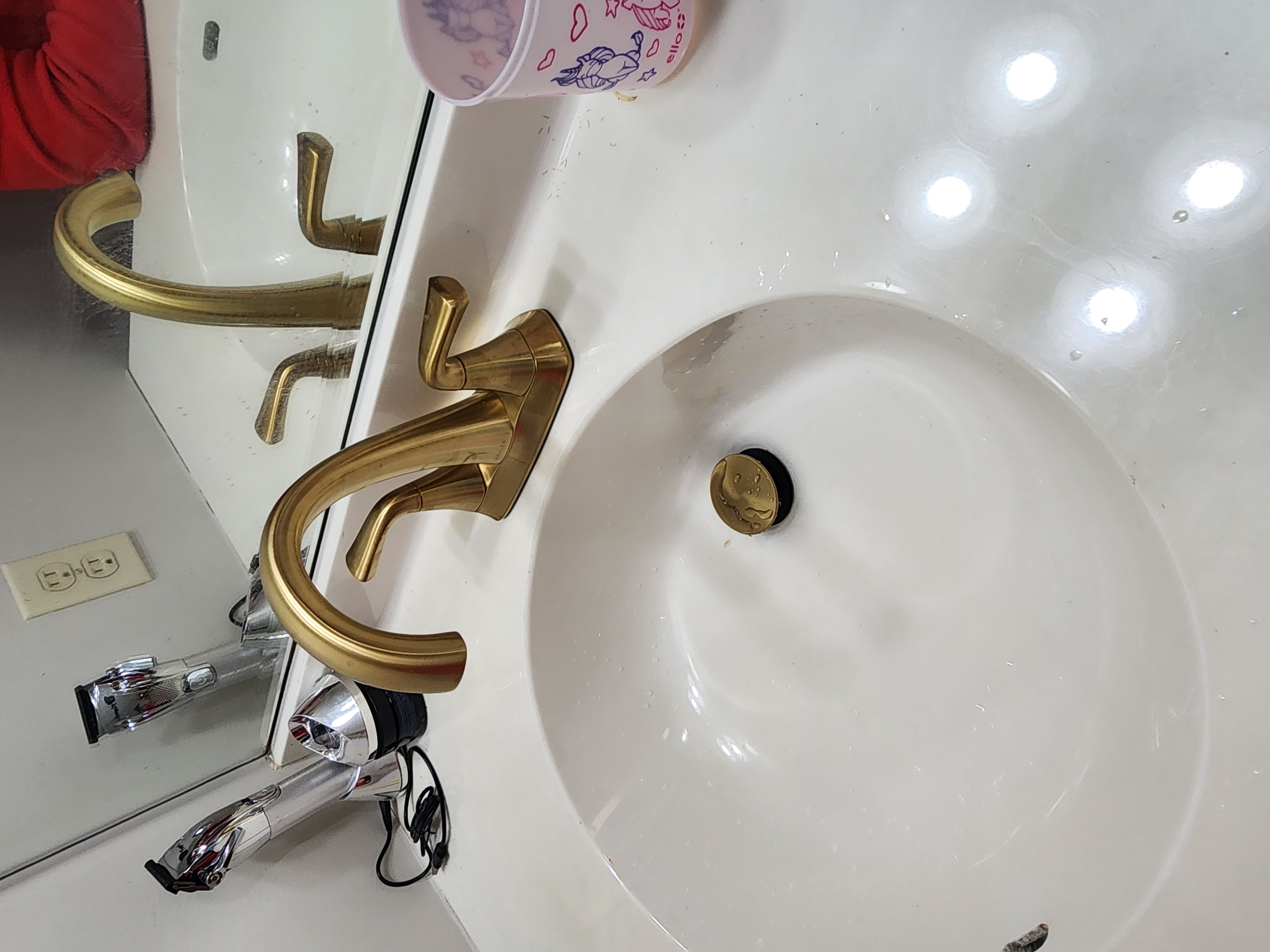 Gold brushed nickel bathroom faucet installation in Pittsburgh PA