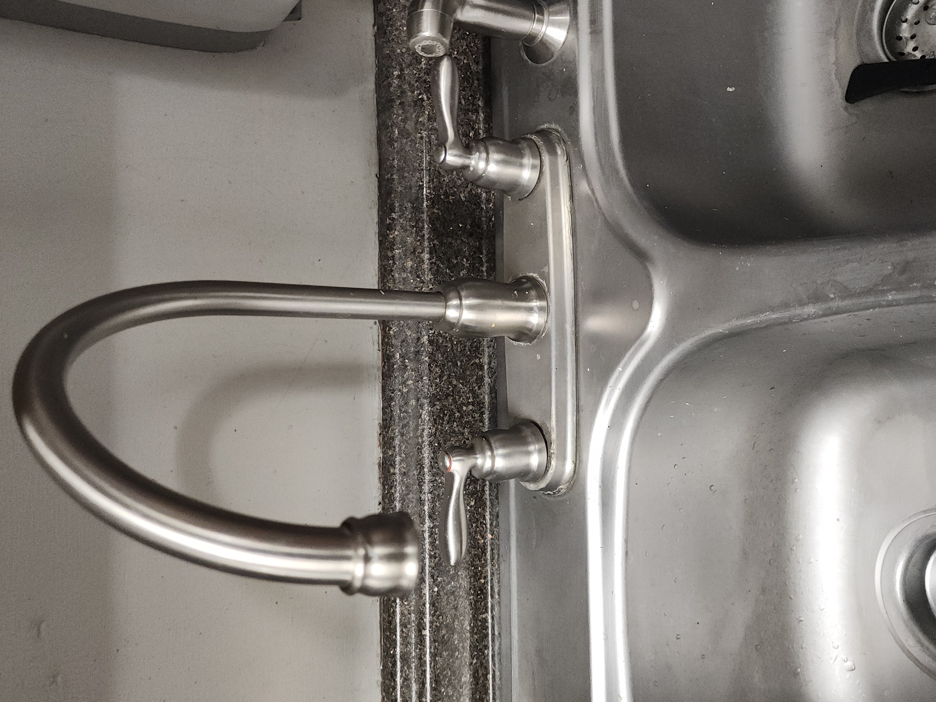 Brushed nickel kitchen faucet installed by Day to Day Plumbing Pittsburgh