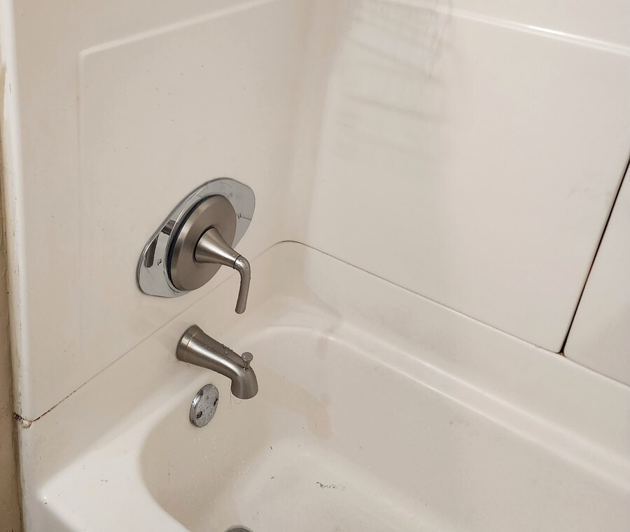 Tub and shower valve replaced with a new spout