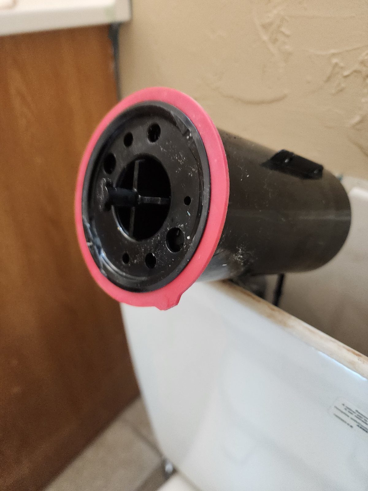 New toilet flush valve canister with replacement seal
