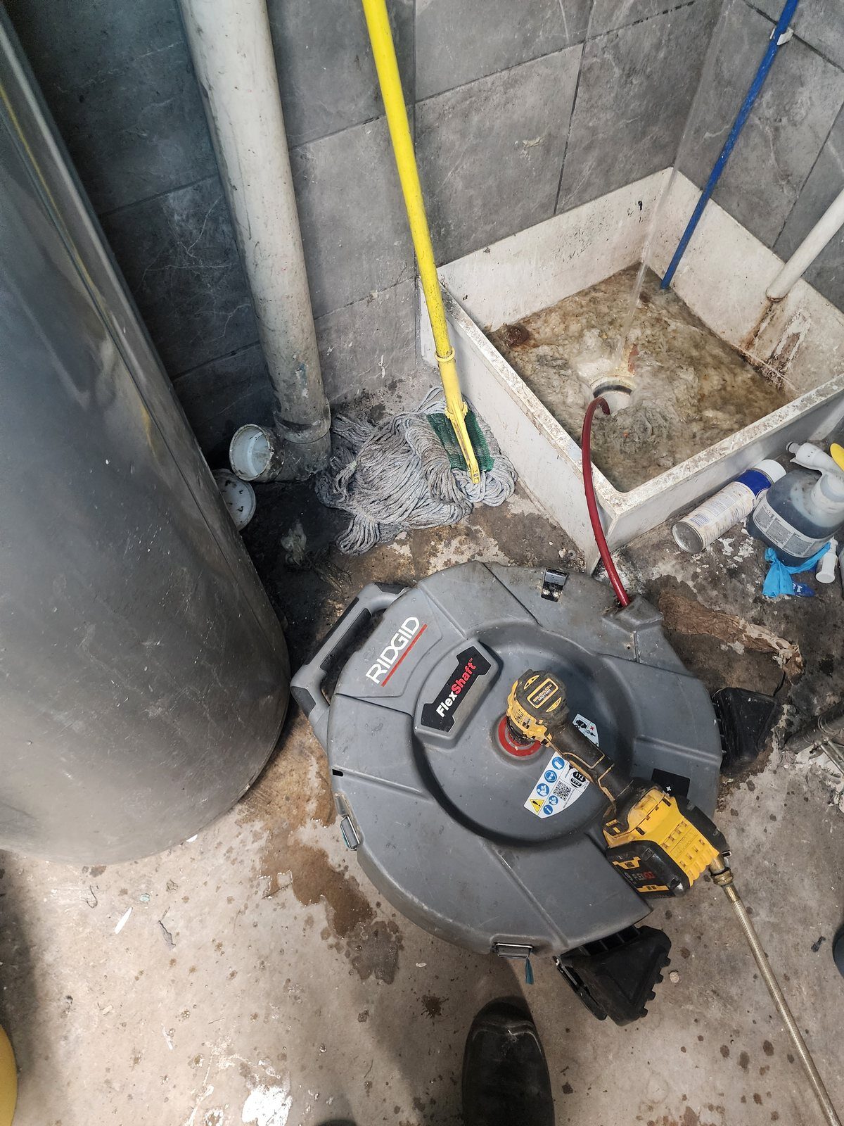 Mop sink draining freely after the blocked line was cleared