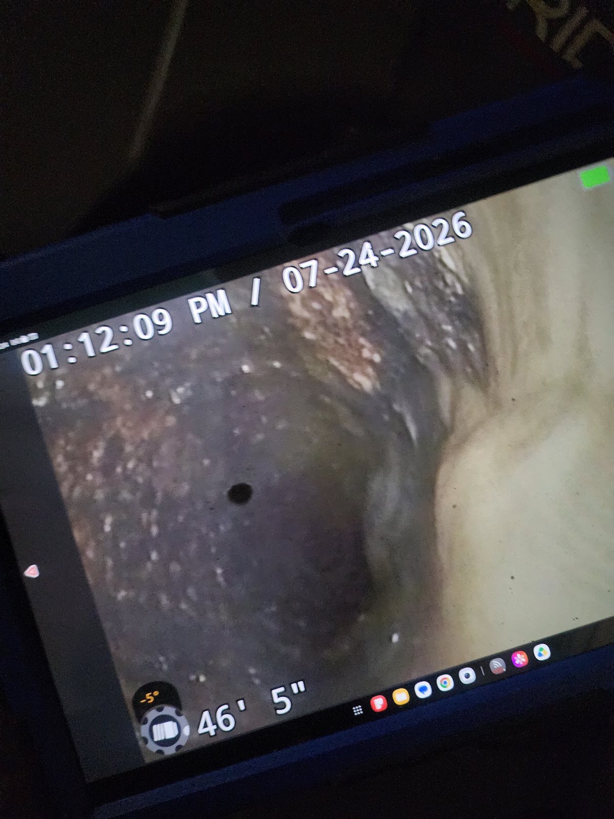 Sewer camera inspection monitor showing the inside of a drain line