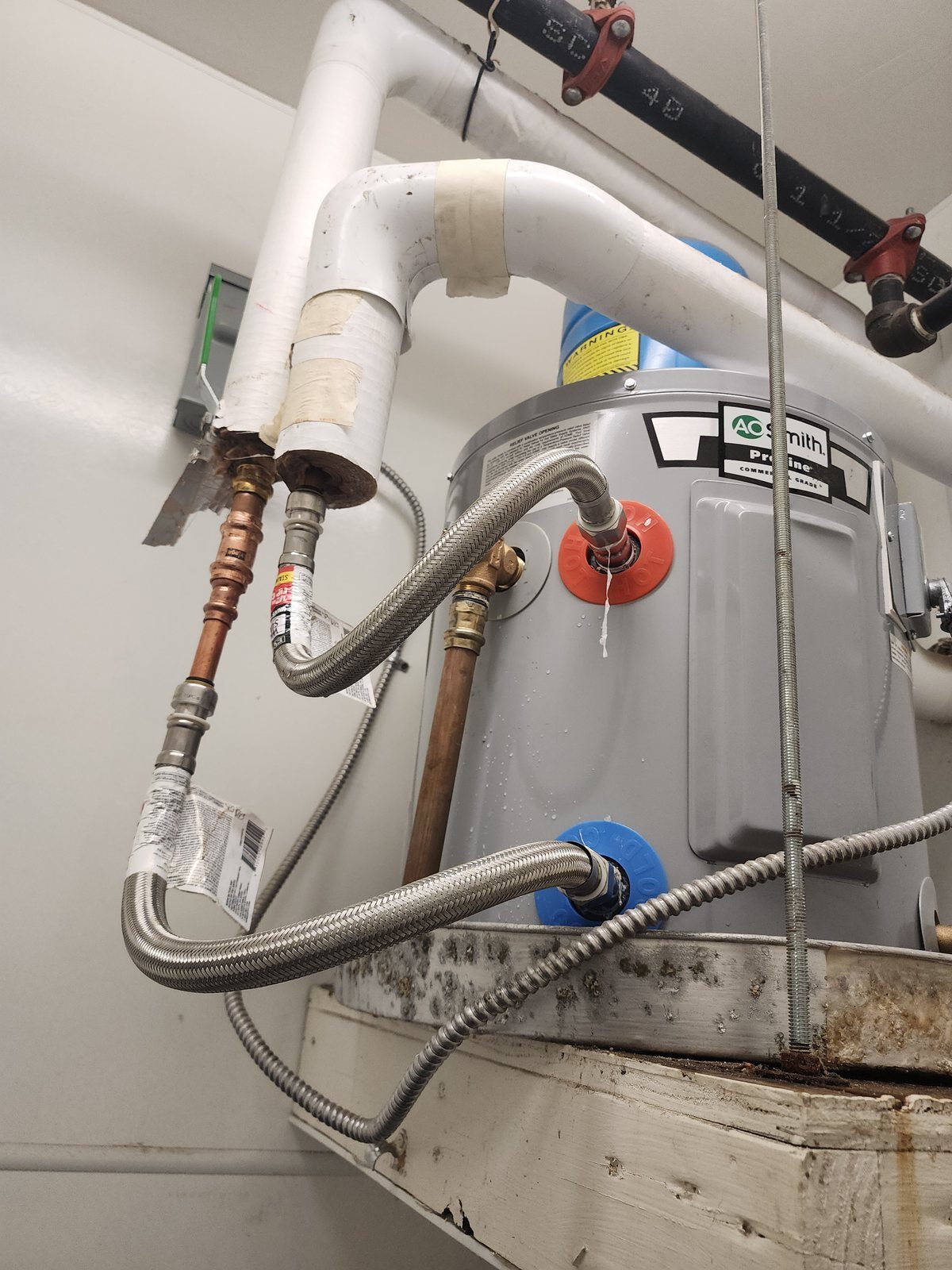 New copper press-fit supply piping run to a replacement water heater