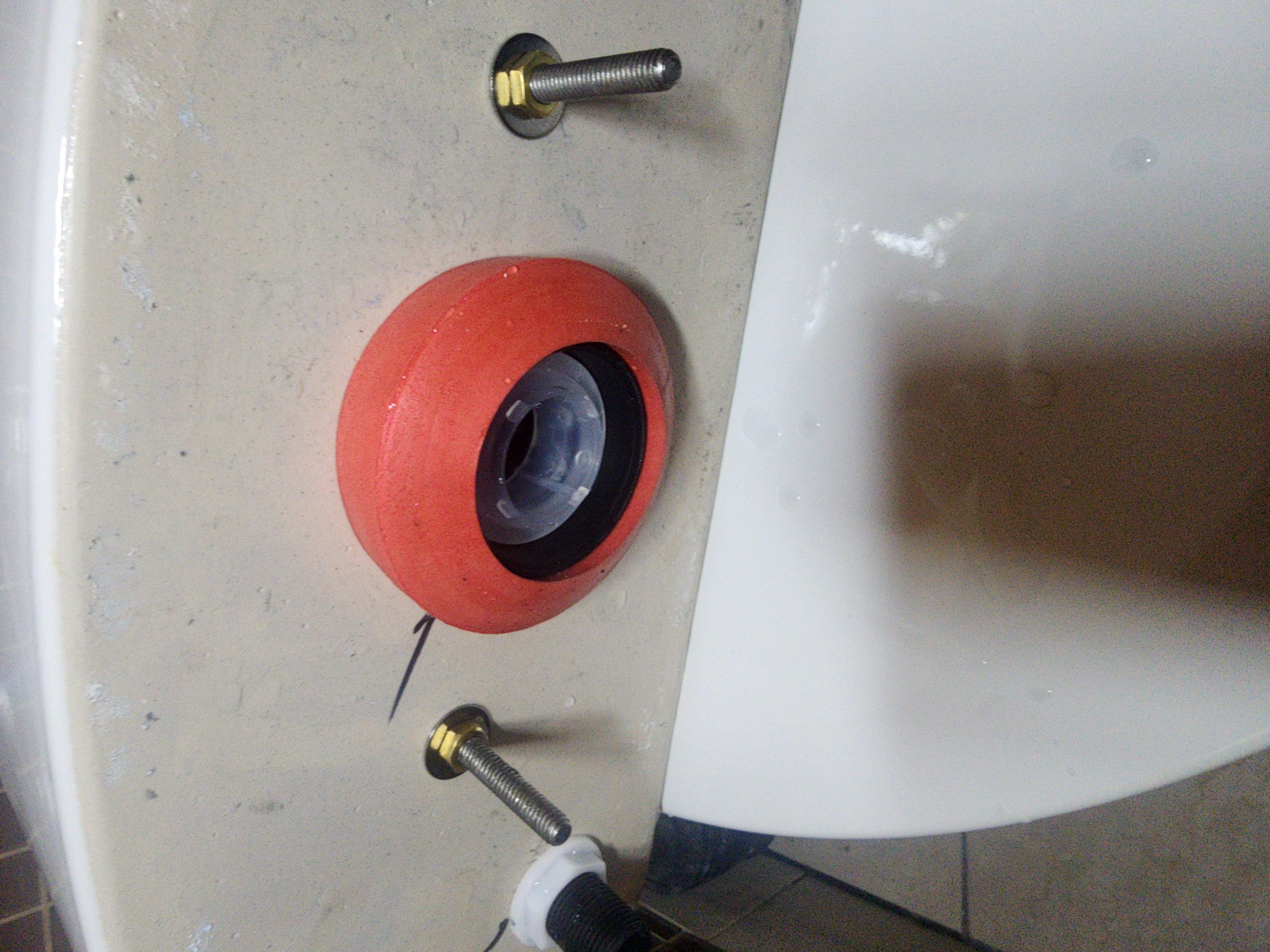 Toilet tank flapper seat replacement for running toilet repair Pittsburgh