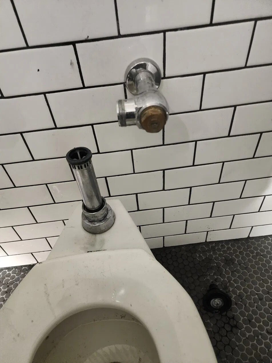 Commercial toilet flush valve repair by Day to Day Plumbing in Pittsburgh PA